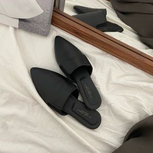 Black leather mules